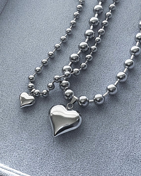 Polished Puffy Triple Drop Heart Earrings 3D Sterling Silver Polished Puffy Triple Drop Heart Earrings 3D Sterling Silver