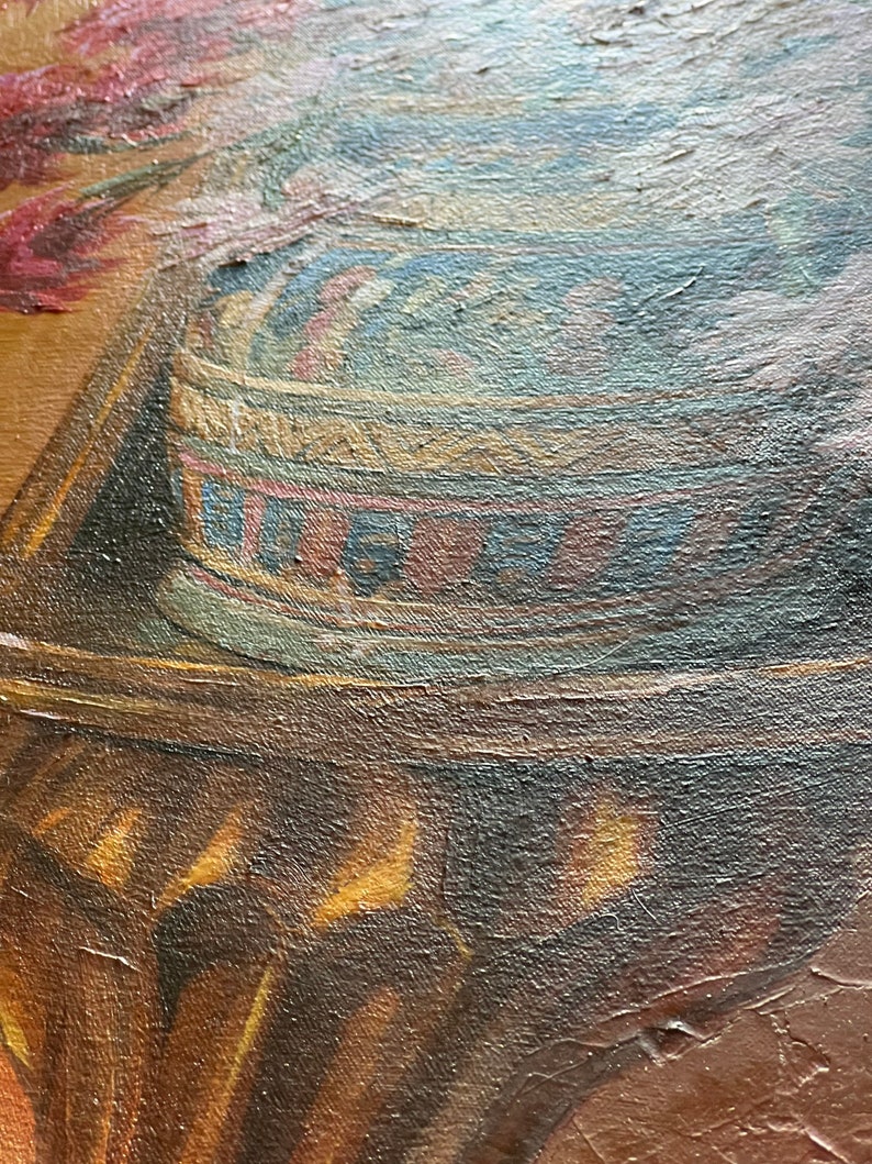 May include: Close-up of a vintage oil painting featuring a detailed depiction of a stack of colorful, striped fabric. The fabric is arranged in a circular pattern and appears to be resting on a wooden surface.