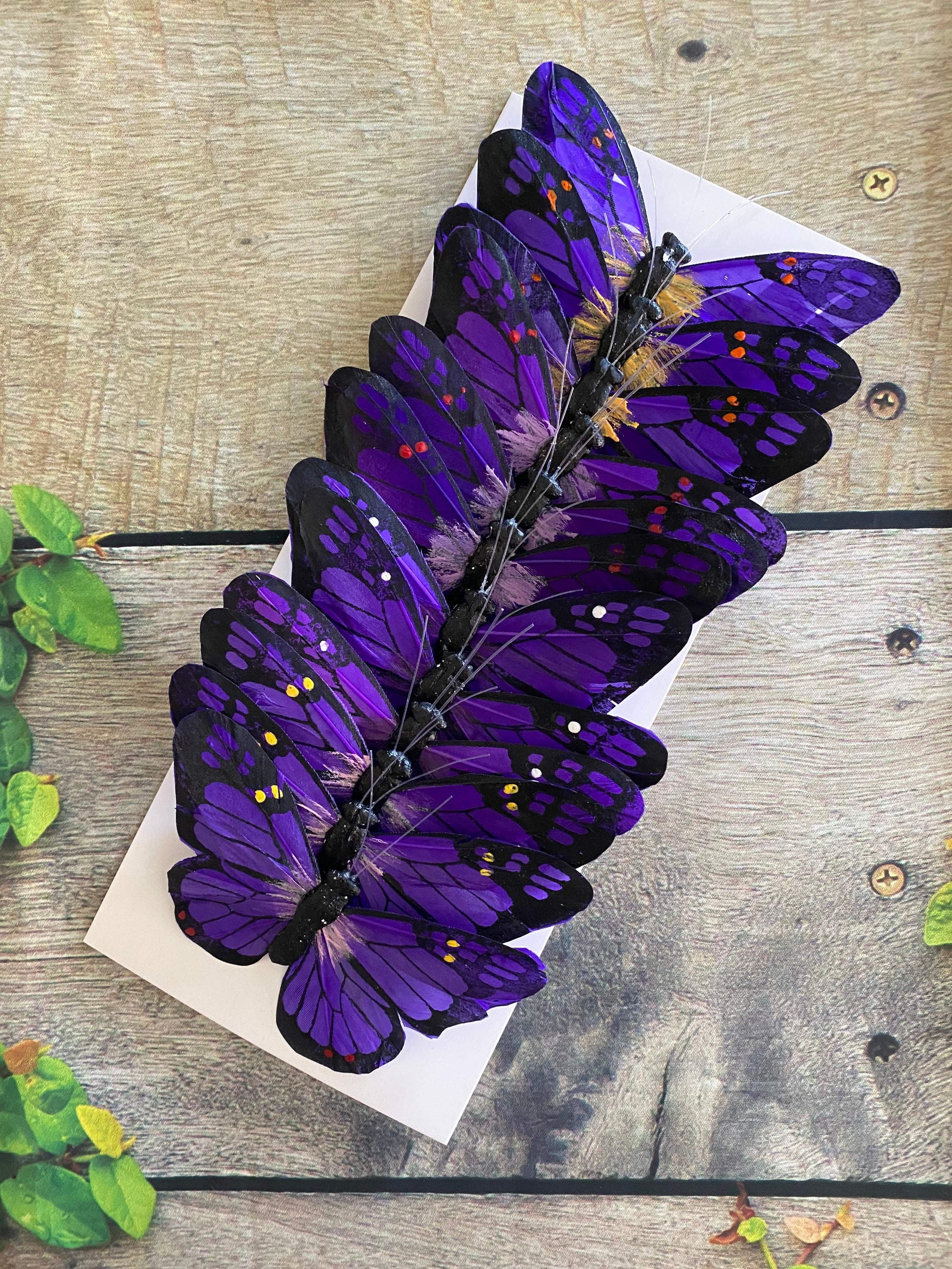 Juego de 12 mariposas de plumas monarca con purpurina en alambre para  arreglos florales y decoraciones de bricolaje (azul/dorado)