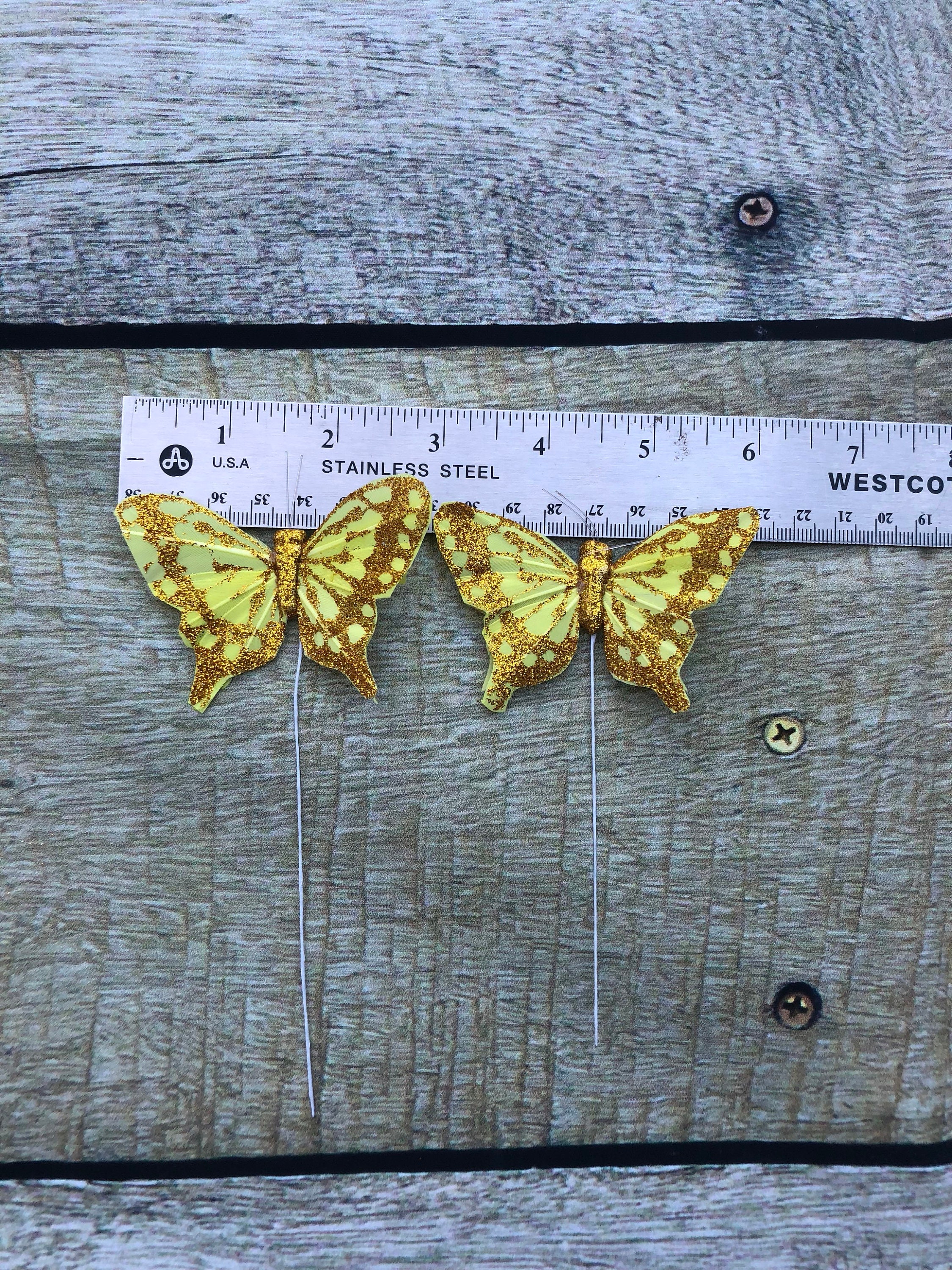 Juego de 12 mariposas de plumas monarca con purpurina en alambre para  arreglos florales y decoraciones de bricolaje (dorado)