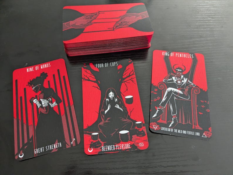 May include: Four tarot cards with black and white illustrations on a red background. The cards are "Nine of Wands", "Four of Cups", "King of Pentacles", and a card with the text "Great Strength" and "Blended Pleasure".