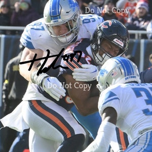 NFL Detroit Lions - Aidan Hutchinson 22 Wall Poster with Magnetic Frame,  22.375 x 34 