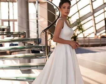 élégante robe de mariée trapèze blanche en satin | Col bateau | Sans manches | Dos nu | Longueur au sol | Robe de mariée empire | Robe de mariée princesse