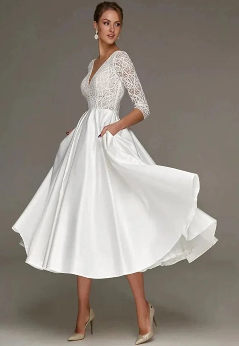 Robe de mariée longueur thé ivoire chic moderne Dentelle à col en V en satin à manches trois-quarts Robe de mariée avec poche Robe de mariée courte image 6