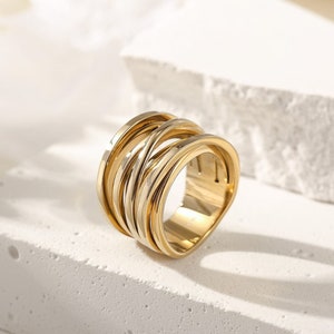 Elegant multistrand crossover style statement ring in yellow gold plating
