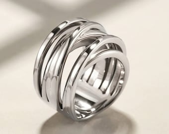 Elegant multistrand crossover style statement ring in white gold plating