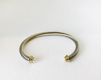 Single plated bangle bracelet in a twisted cable style; White Pearl