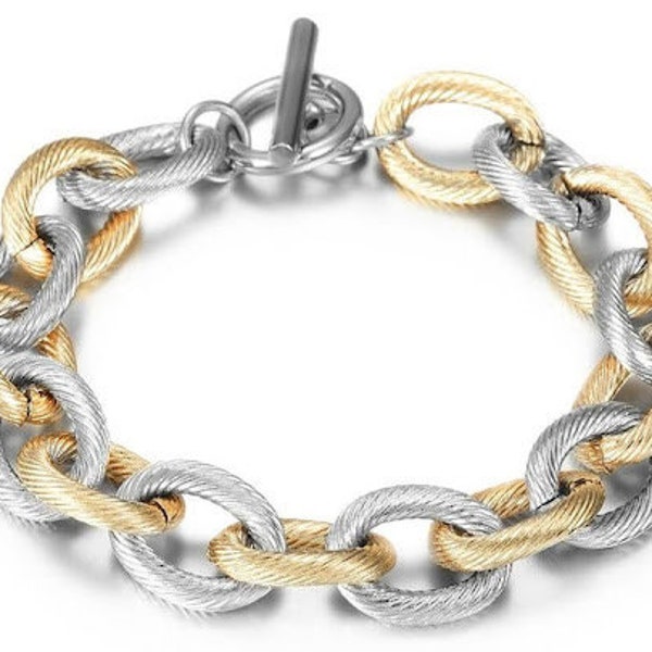 Cable link bracelet in stainless steel and 14kt gold plating; black and silver, silver, gold and silver, gold, black and gold