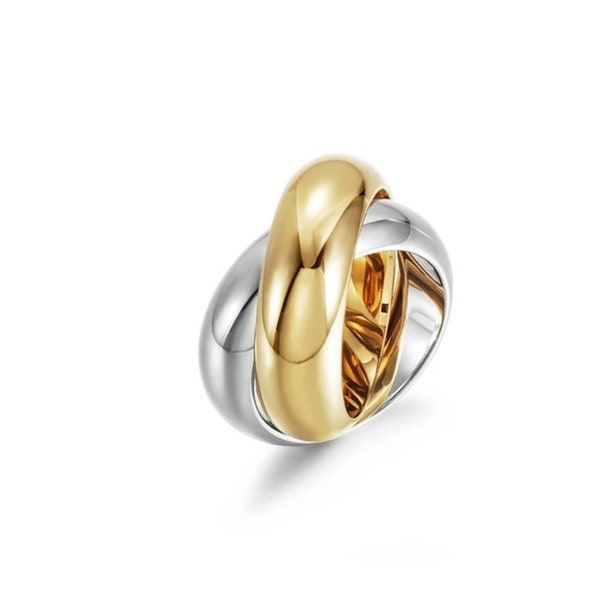 Twisty chunky band ring in yellow gold and silver plating in all sizes with a rolling ring design