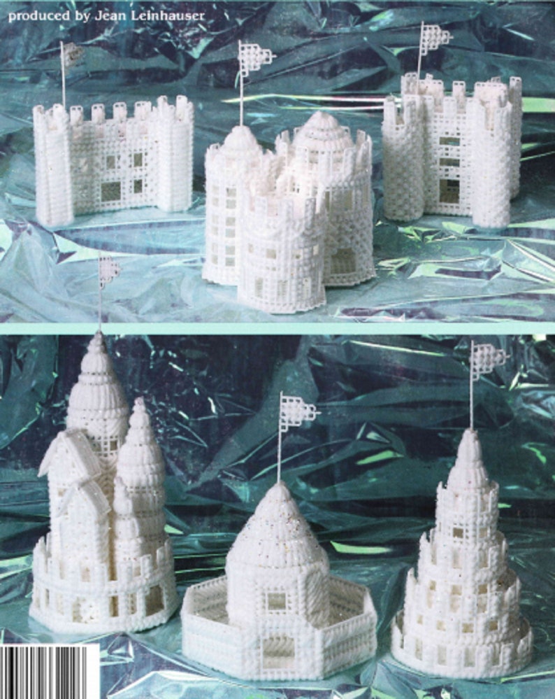 May include: White plastic canvas castle models with various architectural designs, including towers, turrets, and flags. The castles are displayed on a shiny, teal-colored surface. The text "produced by Jean Leinhauser" is visible.