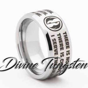 May include: A silver tungsten ring with an engraved inscription that reads "There is no try. There is only do. I serve the balance. There is no death. There is only the Force.  There is no fear. There is only the Force.  There is no darkness. There is only the Force.  There is no death. There is only the Force.  There is no fear. There is only the Force.  There is no darkness. There is only the Force.  There is no death. There is only the Force.  There is no fear. There is only the Force.  There is no darkness. There is only the Force.  There is no death. There is only the Force.  There is no fear. There is only the Force.  There is no darkness. There is only the Force.  There is no death. There is only the Force.  There is no fear. There is only the Force.  There is no darkness. There is only the Force.  There is no death. There is only the Force.  There is no fear. There is only the Force.  There is no darkness. There is only the Force.  There is no death. There is only the Force.  There is no fear. There is only the Force.  There is no darkness. There is only the Force.  There is no death. There is only the Force.  There is no fear. There is only the Force.  There is no darkness. There is only the Force.  There is no death. There is only the Force.  There is only the Force."