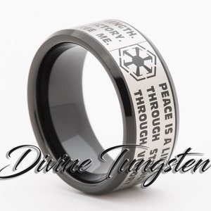 May include: Black tungsten ring with a silver band featuring the Star Wars Galactic Empire symbol and the text "Peace is a lie. There is only passion. And we will have it. Through strength. Through victory. Through me."