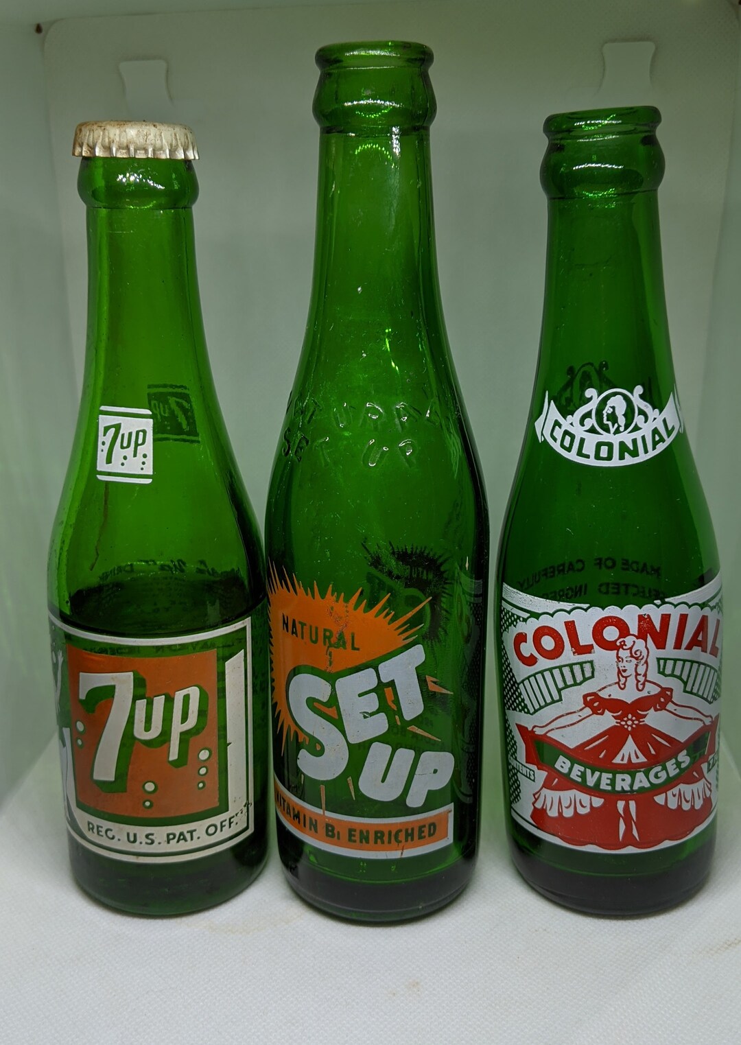 Set of 3 Green Vintage Soda Bottles 1944 7up 1949 Set up and 1956