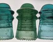 Three CD 106 Glass Insulators Jade and Blue Aqua