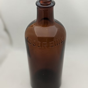 Vintage Asborbine 12 Fl Ounces Amber Bottle