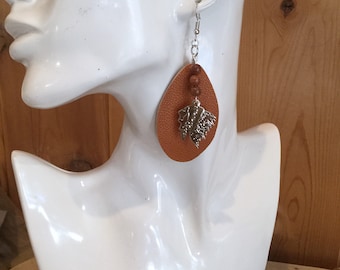 Brown leather goldstone chiefs head beaded earrings, leather earrings, chief earrings, goldstone earrings