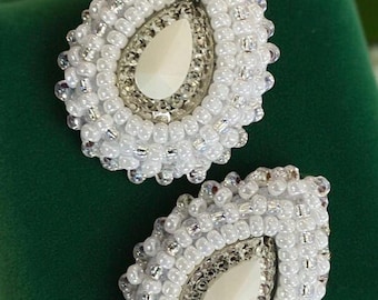 White pearlized teardrop earrings