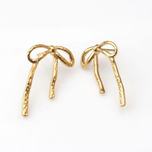 Bow Earrings | Elegant Ribbon-Inspired Jewelry for a Chic and Feminine Look  Ribbon style earrings Gold Bow Earrings Bow stud earrings
