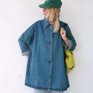 May include: A set of three ceramic mugs with a speckled, matte finish. The mugs are in shades of cream, light gray, and dark gray. Each mug has a simple, minimalist design, perfect for coffee or tea.