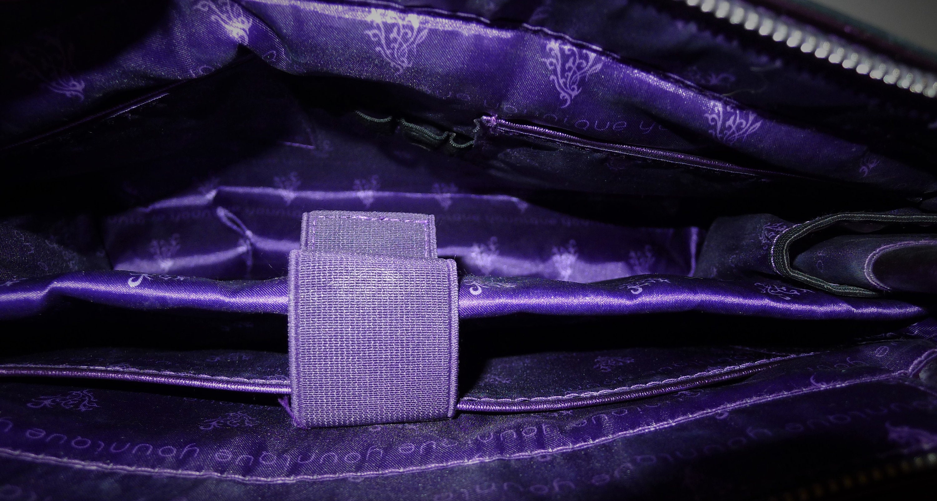 Younique purple purse shop