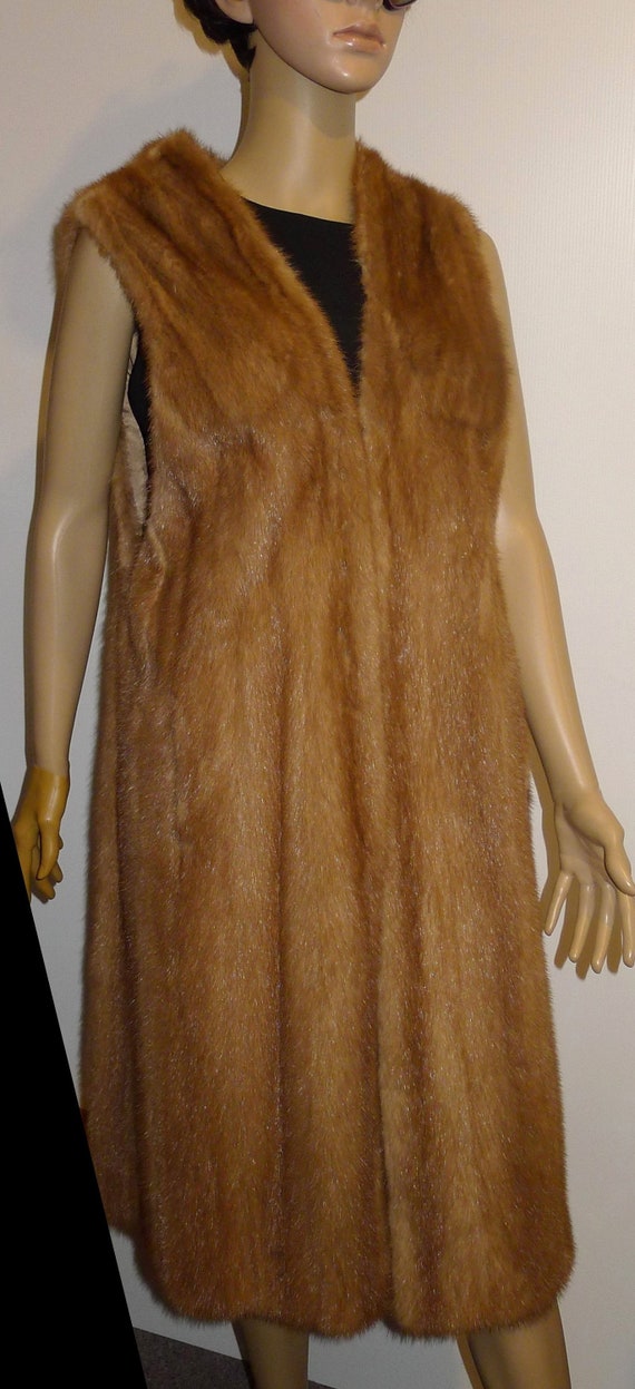 Soft and warm  preowned  pastel mink fur vest or  