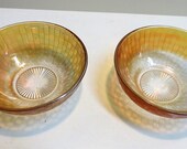 Small orange depression or carnival glass bowls