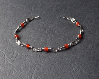 Natural carnelian stone bracelet with surgical steel spiral links / Beaded bracelet with fine gemstones, wire wrapped in France