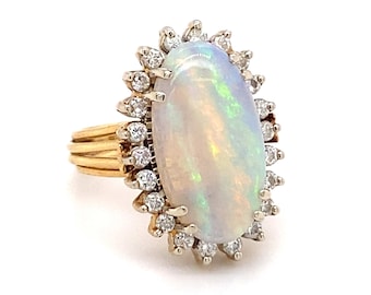 Circa 1950s Retro Oval Opal and Diamond Halo Ring in 18 Karat Gold, FD#477A