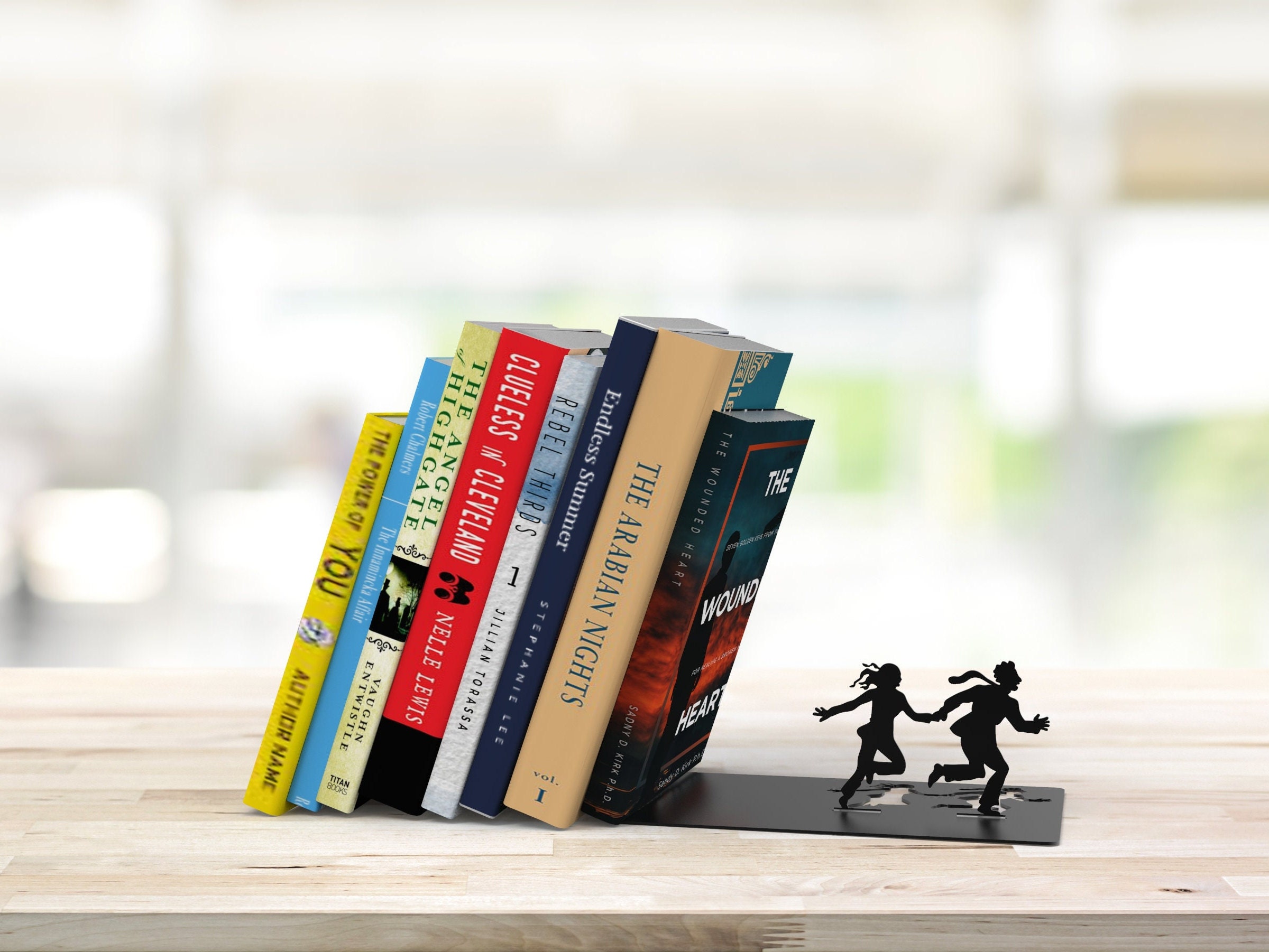 Metal Bookend // Shaped as Two Escaping Figures // Bookends // - Etsy