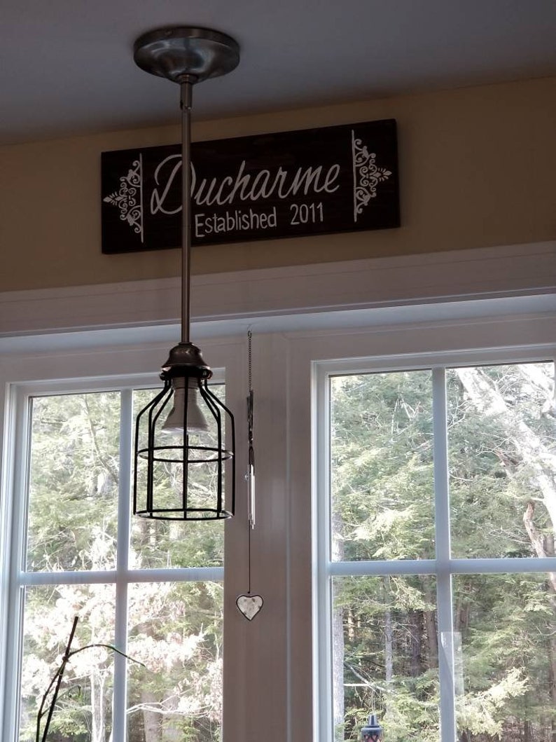 Beautiful name sign makes a great housewarming gift. Family name wooden signs with your established date