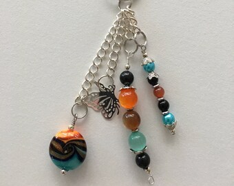 Keychain and Handbag Charm with color beads to match any thing your wearing.