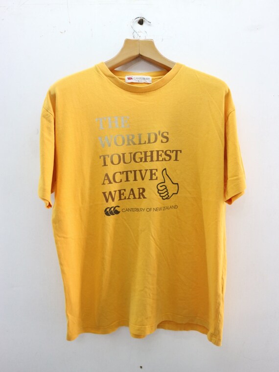 Vintage Canterbury Of New Zealand shirt big logo spell out Orange Size S fits like M