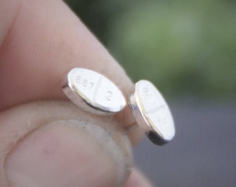 Estradiol stud earrings | PillBling