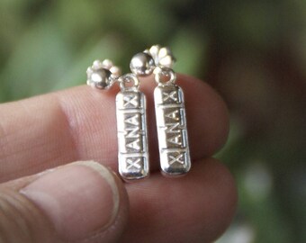 Orecchini con pillole di Xanax / PillBling