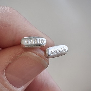 Ambien stud earrings pair | PillBling