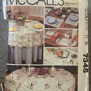 Paquete de mantelería McCall's 7345 VTG Pattern, servilletas y manteles individuales nuevos sin cortar.