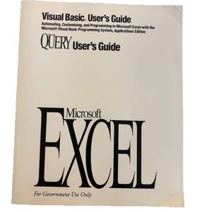 May include: A user's guide for Microsoft Excel, featuring the text "Visual Basic. User's Guide" and "QUERY User's Guide" at the top. The large word "EXCEL" is in bold black font. The text "For Government Use Only" is at the bottom.