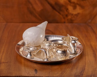 Silver Arati set would be a magnificent and complete collection of ritual implements, designed for performing the sacred Arati ceremony