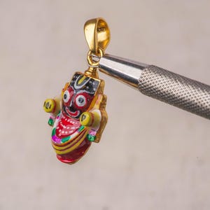 925 sterling silver Jagannath pendant with 24k gold plating would be a beautiful and spiritually significant piece of jewelry for Vaishnavas