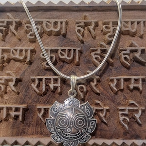Powerful pure silver pendant featuring Lord Jaganath. Made of 925 sterling silver.  Religious Jewelry