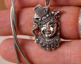 Krishna silver pendant with a silver chain would be a spiritually significant piece of jewelry for devotees of Lord Vishnu