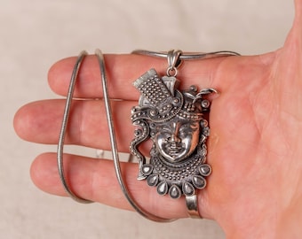 Krishna silver pendant with a silver chain would be a spiritually significant piece of jewelry for devotees of Lord Vishnu