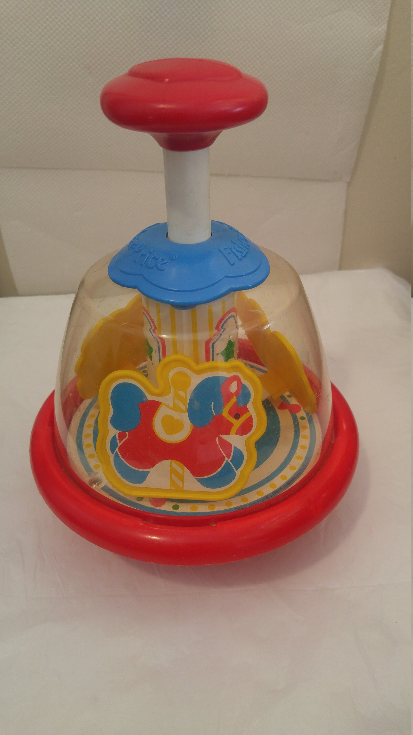 push and spin carousel