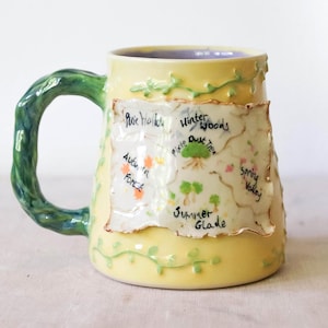 Met de hand gemaakte mok van aardewerk van Millie's Pottery - Pixie Hollow Map Fairies Stoneware Mug
