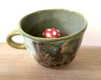 Ceramic peek-a-boo toadstool mug - Fairy Castle Stone Bridge Design with Flowers Peek-a-boo Toadstool Mug