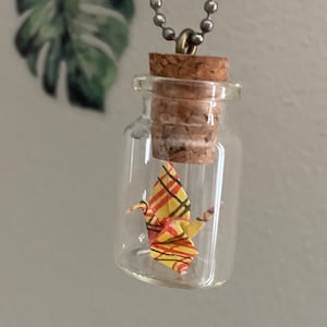 Miniature origami crane tsuru in a bottle keychain