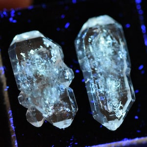 2 blue glow Petroleum Quartz tabby crystals!