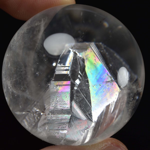 Rainbow Manifesting crystal in Quartz polished sphere gemstone, natural material from Brazil