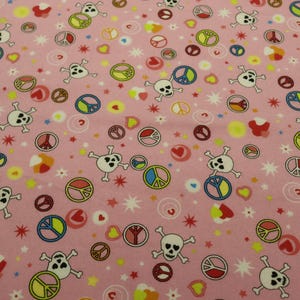 Pink Peace Signs and Skulls Flannel Fabric