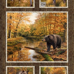 May include: A fabric panel with four framed images depicting wildlife in an autumnal forest. The images show a deer, a moose, a bear, and a bear with a cub, set against a backdrop of fall foliage and a river.